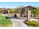 Covered picnic tables offer a relaxing spot to enjoy the outdoors in this community's common area at 2644 E Grenache Rd, San Tan Valley, AZ 85143