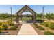 Community picnic area with stone pillars, seating, and lush landscaping offering a relaxing outdoor experience at 2644 E Grenache Rd, San Tan Valley, AZ 85143