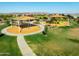 Outdoor playground and swings, providing a fun, and safe recreational space in a community setting at 2644 E Grenache Rd, San Tan Valley, AZ 85143