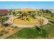 Enjoy the community playground with covered play equipment, walking path and green space for outdoor fun at 2644 E Grenache Rd, San Tan Valley, AZ 85143