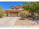 Charming two-story home with a two-car garage and desert landscaping at 298 W Dana Dr, San Tan Valley, AZ 85143