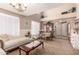 Cozy living room featuring neutral tones, plush seating, and decorative accents at 298 W Dana Dr, San Tan Valley, AZ 85143
