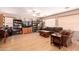 Bright living room with wood floors, comfortable seating, and ample natural light at 298 W Dana Dr, San Tan Valley, AZ 85143