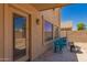 Covered patio with outdoor seating, providing a relaxing outdoor space at 298 W Dana Dr, San Tan Valley, AZ 85143