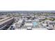 Breathtaking aerial view showcasing a modern complex with a sparkling pool, manicured grounds, and urban surroundings at 310 S 4Th St # 1601, Phoenix, AZ 85004