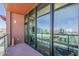 This private balcony provides stunning city views through large glass sliding doors at 310 S 4Th St # 1601, Phoenix, AZ 85004