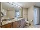 Elegant bathroom with double sinks, large mirror, and modern fixtures at 310 S 4Th St # 1601, Phoenix, AZ 85004