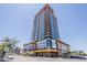 Modern high-rise building features sleek architecture and a prominent street-level presence at 310 S 4Th St # 1601, Phoenix, AZ 85004