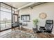 Well-lit living room boasts hardwood floors, modern furnishings, and an open balcony at 310 S 4Th St # 1601, Phoenix, AZ 85004
