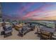 Relaxing rooftop deck showcases amazing city views, comfortable seating, and a cozy fire pit at 310 S 4Th St # 1601, Phoenix, AZ 85004