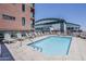 Rooftop pool with lounge seating offers relaxation and stunning city views at 310 S 4Th St # 1601, Phoenix, AZ 85004