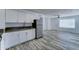 Bright kitchen offering stainless steel appliances, white cabinets, and modern finishes at 3107 W Lisbon Ln, Phoenix, AZ 85053