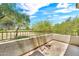 Balcony overlooking a golf course and lush landscaping, perfect for relaxing outdoors at 3131 E Legacy Dr # 1032, Phoenix, AZ 85042