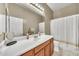 Bright bathroom featuring a neutral color scheme and a vanity with a white countertop at 3131 E Legacy Dr # 1032, Phoenix, AZ 85042
