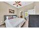 Comfortable bedroom with an ensuite bathroom, natural light, and neutral color scheme at 3131 E Legacy Dr # 1032, Phoenix, AZ 85042