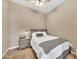 Cozy bedroom featuring a full bed, nightstand, and soft, neutral tones at 3131 E Legacy Dr # 1032, Phoenix, AZ 85042