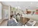 The dining room flows into the living room and kitchen in an open-concept floor plan that is perfect for entertaining at 3131 E Legacy Dr # 1032, Phoenix, AZ 85042