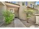 Inviting front entrance with manicured landscaping and a covered porch at 3131 E Legacy Dr # 1032, Phoenix, AZ 85042