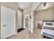 Hallway with a bedroom and en-suite bathroom on the right, and doors leading to other rooms at 3131 E Legacy Dr # 1032, Phoenix, AZ 85042