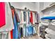 Organized walk-in closet with ample hanging space and shelving for storage and luggage at 3131 E Legacy Dr # 1032, Phoenix, AZ 85042
