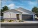 Charming single-story home with a two-car garage, neutral paint, and low maintenance desert landscaping at 31339 N Pinot Dr, San Tan Valley, AZ 85143
