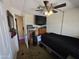 A cozy bedroom features neutral walls and a ceiling fan for added comfort at 3330 E Main St # 121, Mesa, AZ 85213