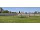 Community dog park offers a secure, fenced space for pets to play with benches and shade at 3330 E Main St # 121, Mesa, AZ 85213