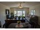 Inviting living area featuring ceiling fan, big windows, and ample natural light at 3330 E Main St # 121, Mesa, AZ 85213