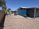 Exterior view of the home showing the easy to maintain rock landscaping at 3330 E Main St # 121, Mesa, AZ 85213