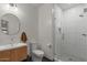 Contemporary bathroom with a glass-enclosed shower, modern fixtures, and a stylish vanity at 3523 E Alfalfa Dr, Gilbert, AZ 85298