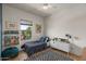 Cozy bedroom with a reading nook, playful decorations and natural light at 3523 E Alfalfa Dr, Gilbert, AZ 85298