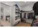 Well-organized walk-in closet featuring ample shelving and hanging space for optimal storage at 3523 E Alfalfa Dr, Gilbert, AZ 85298