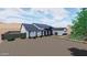 New home with a dark gray roof, white siding, desert landscaping and a gravel front yard at 35809 N Evermore Madison St, San Tan Valley, AZ 85140