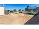 Large backyard with a trampoline offers plenty of room for outdoor activities at 3807 W Abraham Ln, Glendale, AZ 85308