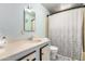 This bathroom features a shower/tub, vanity with a sink, and updated fixtures at 3807 W Abraham Ln, Glendale, AZ 85308