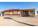 Charming single-story home with a covered parking area and well-kept front yard at 3807 W Abraham Ln, Glendale, AZ 85308