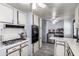 Functional kitchen featuring stainless steel appliances, double wall-oven, and modern cabinetry at 3807 W Abraham Ln, Glendale, AZ 85308