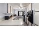 Well-lit kitchen with stainless steel appliances, abundant counter space, and modern fixtures at 3807 W Abraham Ln, Glendale, AZ 85308