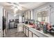 Bright kitchen featuring modern appliances, ample counter space, and stainless steel sink at 3807 W Abraham Ln, Glendale, AZ 85308