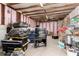 Ample storage space with wooden beams and unfinished walls at 3807 W Abraham Ln, Glendale, AZ 85308