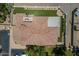Aerial view of house with brick roof and turf backyard at 3812 E Camelback Rd, Phoenix, AZ 85018