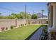 Landscaped backyard with block fence and mountain views at 3812 E Camelback Rd, Phoenix, AZ 85018