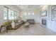 Inviting living room featuring comfortable seating, a fireplace, and abundant natural light at 3812 E Camelback Rd, Phoenix, AZ 85018