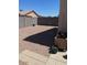 Low maintenance backyard with gravel and block wall at 40047 N Cassara Dr, San Tan Valley, AZ 85140