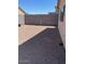 Low maintenance backyard with gravel and block wall at 40047 N Cassara Dr, San Tan Valley, AZ 85140