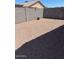 Low maintenance backyard with gravel and block wall at 40047 N Cassara Dr, San Tan Valley, AZ 85140