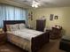 Comfortable bedroom with a queen-size bed, ample natural light, and neutral decor at 40047 N Cassara Dr, San Tan Valley, AZ 85140