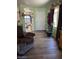 An entryway with durable vinyl flooring, soft green walls, and ample natural light at 40047 N Cassara Dr, San Tan Valley, AZ 85140
