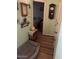Decorated hallway leading to a bedroom, featuring stylish accents and warm lighting at 40047 N Cassara Dr, San Tan Valley, AZ 85140