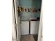 Convenient laundry room featuring a washer, dryer, and shelving for storage at 40047 N Cassara Dr, San Tan Valley, AZ 85140